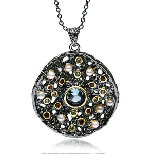 Mixed black/gold round pendant necklace